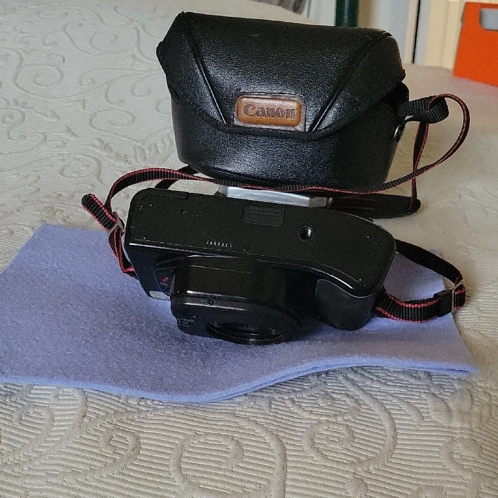 Canon Vintage Black Film Camera with Red Accents